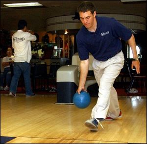 Democratic congressional candidate Ben Konop takes aim at Seneca Lanes in Fostoria. Mr. Konop, who is attempting to unseat Rep. Mike Oxley, is on a six-day, 23-city bowling tour in an attempt to drum up grass-roots support in Ohio's 4th District.