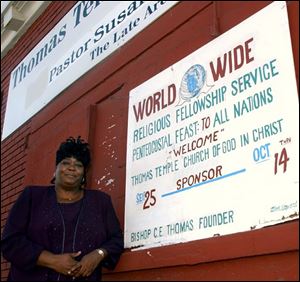 Fea  thomas20p  2140 Ashland Ave,  Thomas Temple Church of God in Christ.  Pastor  Susan Coleman outside the church.  Diane Hires  9/20/04