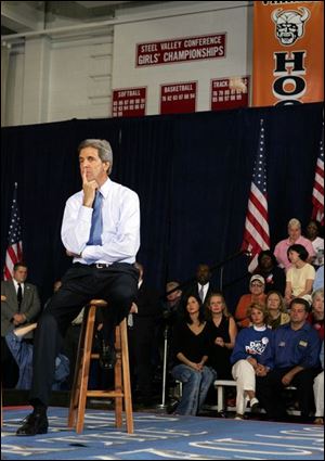 U.S. Sen. John Kerry, the Massachusetts Democrat hoping to unseat President Bush, ponders a question from the audience at Austintown Fitch High School.