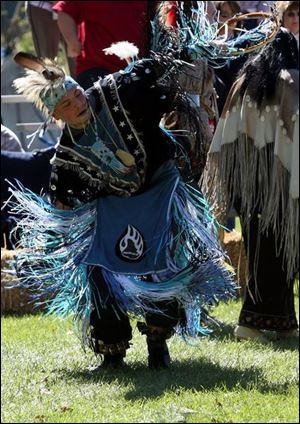 Kyle Crawford of Muskegon, Mich., performs during a ceremony yesterday at the Second Annual Intertribal Powwow at Buttonwood Park near Perrysburg.