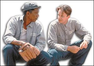 Morgan Freeman, left, and Tim Robbins in <i>The Shawshank Redemption</i>.