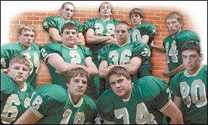 St. Mary Catholic Central defensive starters include (front, from left) Joel Langton, Joe Boggs, Kyle Wawrzyniec, Nathan Roelant, (center, from left) Eric Wickenheiser, Matt Wszelaki, Matt Mueller, John Kipf and (back, from left) Neal Howey, Nick Jordan, and David Thomas.