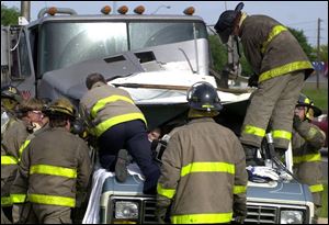 Toledo firefighter services such as extrication and first aid would be billed to the insurance companies of motorists in an accident. The plan is intended to reduce the city's deficit.