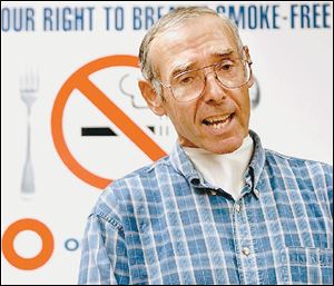 Richard Fox believes second-hand cigarette smoke caused his throat and lung cancer.