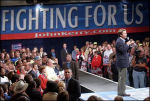 John Edwards campaigns in Canton, a hard-hit northeast Ohio industrial city. Mr. Edwards said a Kerry administration would reward industries that increase domestic employment.