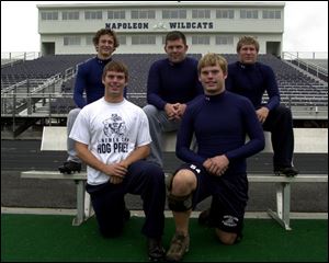 Some of the players whose fathers also were Wildcats are (back, from left) Elliot Vocke, Kyle Fruth and Brad Weaver, and (front, from left) Adam Miller and Keil Miller.