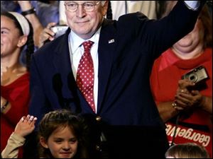 Vice President Dick Cheney, campaigning with granddaughters Elizabeth, left, and Kate, tells a Nazareth, Pa., crowd the United States remains focused on the war on terror.
