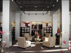 Duket Porter Associates of Toledo won first place in the design competition for Sophie's Sister, a woman's clothing store in a historic building at 133 North Michigan Street. 
