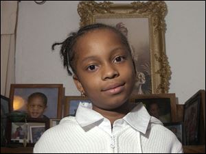 Aniqua Winters of Sherman Elementary School is thankful for family and friends in time of war.
