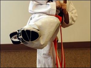 Luke Mullin of St. Anthony School is thankful for being able to do Tae Kwon Do.