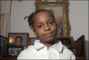 Aniqua Winters of Sherman Elementary School is thankful for family and friends in time of war.