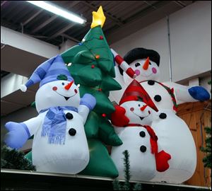 Snowmen at The Andersons are among the seasonal standbys in inflatable outdoor decoration. 