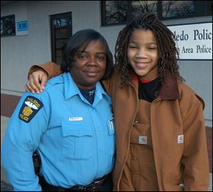 Through the STRIVE program, Toledo Police Officer Flo Wormely  has helped many young people graduate from high school.