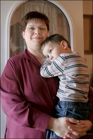 Wauseon-area resident Brenda Canada, with her son, Andrew, 4, also is the mother of two daughters who are in their 20s.