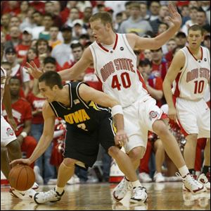 Matt Sylvester (40) and his Ohio State teammates held Iowa's Jeff Horner to nine points.