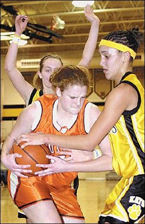 Southview's Kelsey Navarre tries to keep the ball from Northview's Niki McCoy, who scored 14 points.