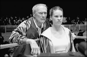 Frankie Dunn (Clint Eastwood) is a grizzled old trainer who agrees to coach a feisty upstart boxer,Maggie (Hilary Swank).
