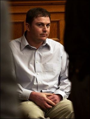 Eric Harmon awaits the verdict outside the courtroom; he was found guilty in the slaying.