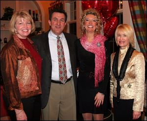 FINE DINING: From left, Patti Jo and Bill Fantozz, Annette Gruetter, and Betty Lazzaro have a fine time 'Dining for the Y.'