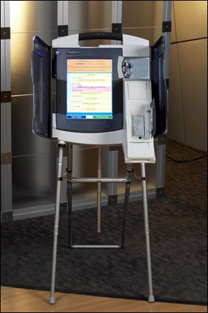 Lucas County election officials want touch-screen devices that provide receipts.