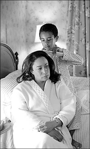 Young Ruben (Marcus Carl Franklin) tends to Nanny (S.
Epatha Merkerson).