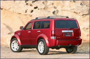 The Dodge Nitro SUV, a concept vehicle that is shown here
from the rear, is expected to provide customers an alternative
in between the Jeep Liberty and the Dodge Durango.