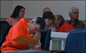 Mark Stephenson sits in front of his family as he awaits sentencing for the aggravated murder of his estranged girlfriend. 