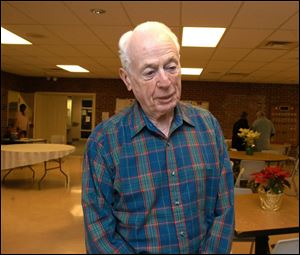 Jim McClellan is a volunteer who gives help in the new dining area of the Maumee Senior Center on Detroit Avenue.