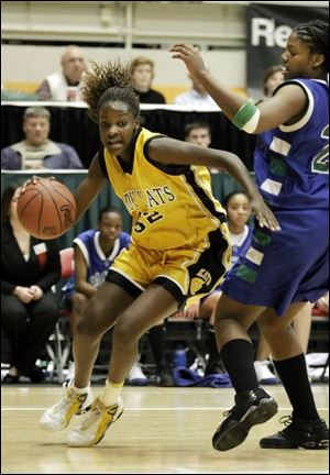 Riana Miller drives past Chaminade-Julienne's Aisha Jefferson. Miller led Northview with 11 points and 10 rebounds.