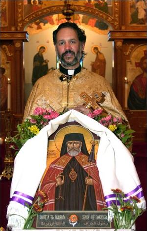 The Rev. Paul Albert has a painting of St. Raphael at St. Elias Antiochian Orthodox Church in Sylvania.