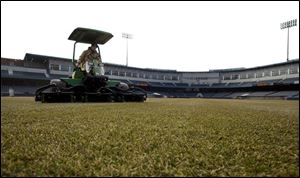 ROV mudhens       Matt Henn a grounds worker at the Toledo Mud Hens Stadium mows the  field in preparation for Apirl 15 the first hens game for 2005,  Monday afternoon 3/14/05.  The Blade/Madalyn Ruggiero