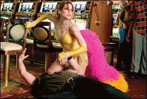 FBI Agent Gracie Hart (Sandra Bullock) portrays a Las Vegas showgirl in a scene from Miss Congeniality 2.
