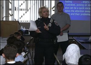 Officer Alessandra Norden speaks at the Islamic School of Greater Toledo on bully prevention. 