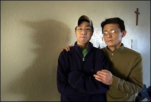 Andrew Jung and his father, Dai Jung, don t know when they ll see mother and wife Yung Jung
again. She has been moved from jail to jail in Michigan since her arrest fi ve weeks ago.

