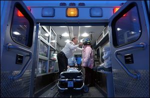 Richard Levine, the owner of Hart Medical EMS, shows off the inside of an ambulance during an open house in December.