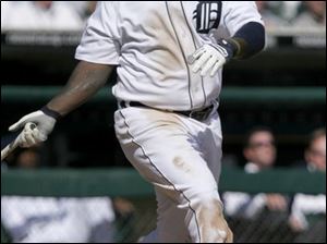 Dmitri Young, who was 4-for-4 with 5 RBIs, became the first Tiger to hit three home runs on opening day and the third player in major league history. 