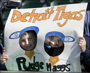 A Comerica Park record crowd of 44,105 fans enjoyed opening day, including brother and sister Mitchel and Rachel Hughes.
