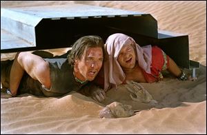 Dirk Pitt (Matthew McConaughey), left, is assisted by his sidekick,
Al Giordino (Steve Zahn) in Sahara.