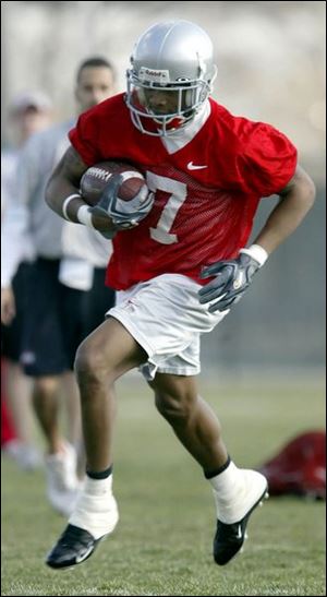 Ted Ginn Jr. works out at spring practice. The freshman ignited the Buckeyes with big plays last season.