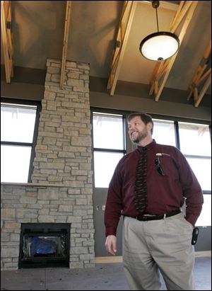 Neil Munger, director of the Wood County Park District stands in the great room of the $1.2 million nature center that's under construction at the W.W. Knight Nature Preserve in Perrysburg Township.