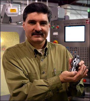 Jeff Frazier, president of Frazier Machine and Production Inc., relies on many companies as buyers to keep his business in precision parts going. 
