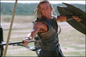 Some of the more graphic portions of Brad Pitt s movie Troy were edited out in the  sanitized  version
of the fi lm, and Hollywood studios and directors are incensed about the practice.
