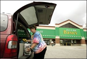 The Food Basics on Cherry Street has been a convenient supermarket for shoppers like Kim Huss.