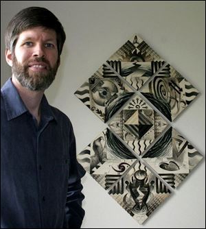 Kevin Anderson stands by a ceramic artwork whose tiles depict the 'seven spiritual practices.'