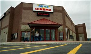 Entertainment-seeking patrons enter Skye Cinema in Wauseon at its opening last night.
