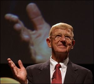 Lou Holtz, who took six schools to bowl games, addresses the
Urban All-American Awards Celebration at SeaGate Centre.