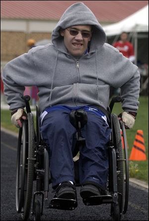 Shane Herman, from Wood County, finished first in the 400-meter wheelchair event.