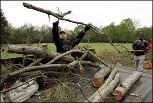 Michael Garcia and Dominique Wiggins work at Side Cut Metropark. Mr. Garcia has almost paid his $322.85 restitution bill.