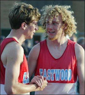 Sean Zimmerman, left, and James O Brien celebrate an Eastwood victory in the 1600 relay. O Brien also won the 800.
