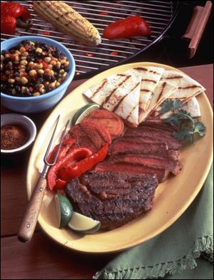 Steaks with Mexican Grill Rub,
Grilled Quesadillas, and Grilled
Mexican Onions.